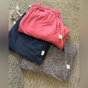 3 Vuori Performance Pants. Rust, Dark Blue and Grey